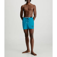 Calvin Klein Swimshort Medium Double WB Short de Bain Homme Clear Turquoise